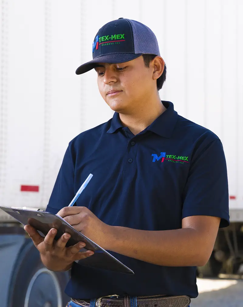 Image of a Tex-Mex employee taking inventory of resources.
